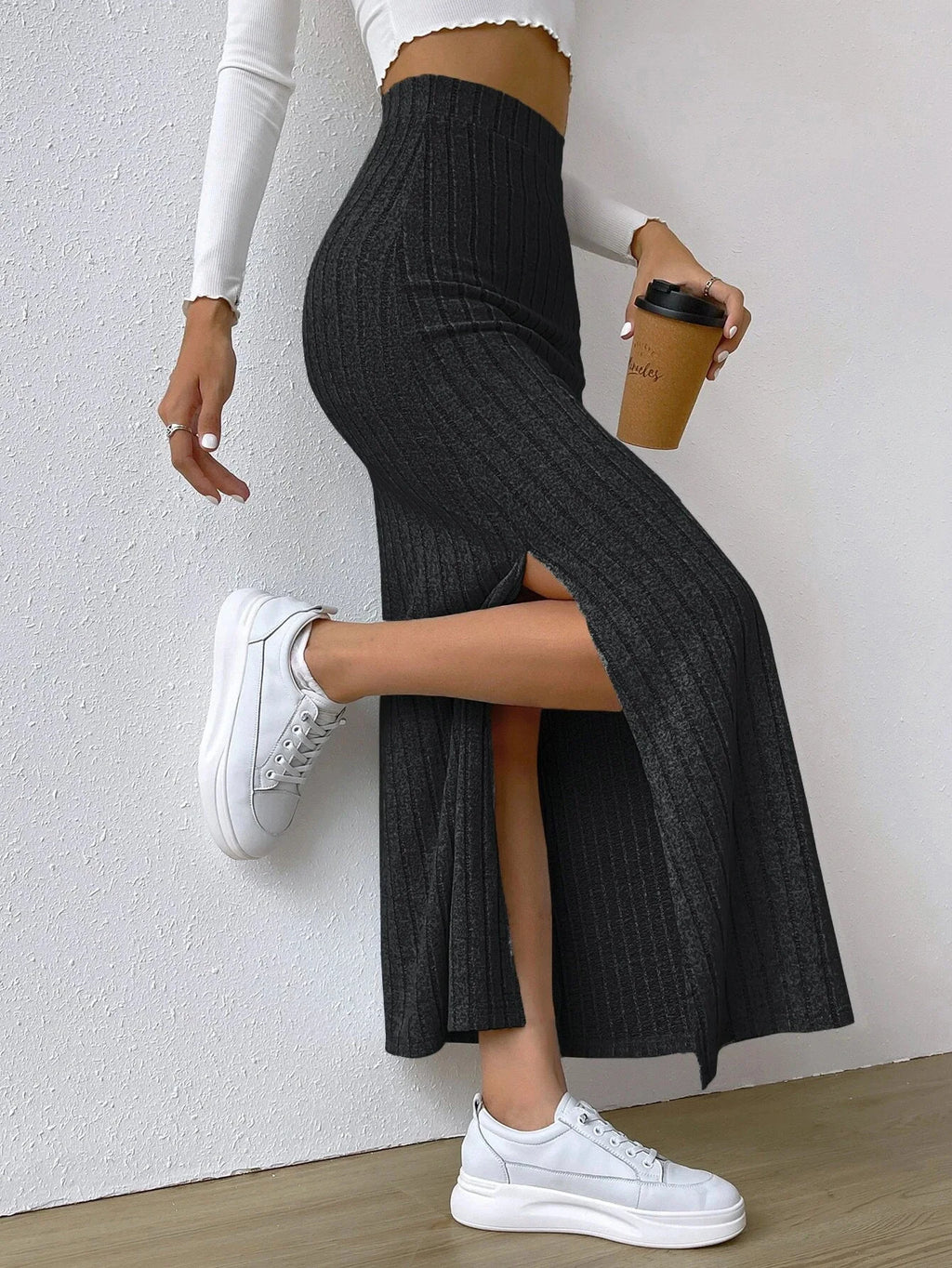 2026 Fashion Spring/Summer New Collection: High-waisted, side-split, fitted, knitted mini skirt for women.