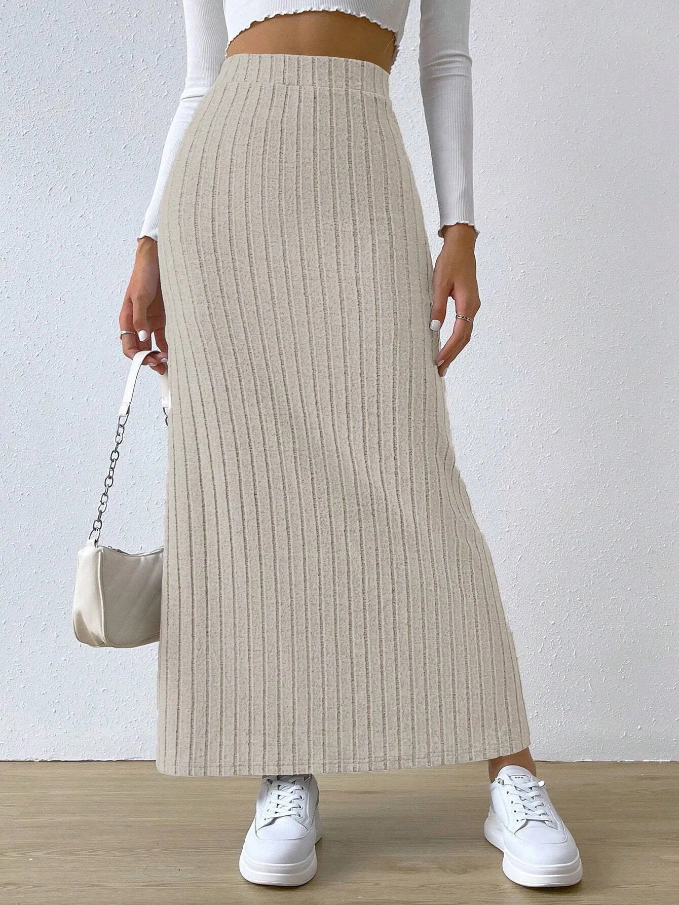2026 Fashion Spring/Summer New Collection: High-waisted, side-split, fitted, knitted mini skirt for women.